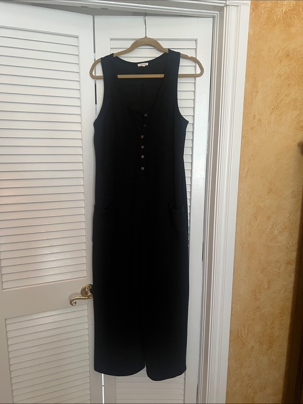 Classic Black Sleeveless Button-Front jumpsuit